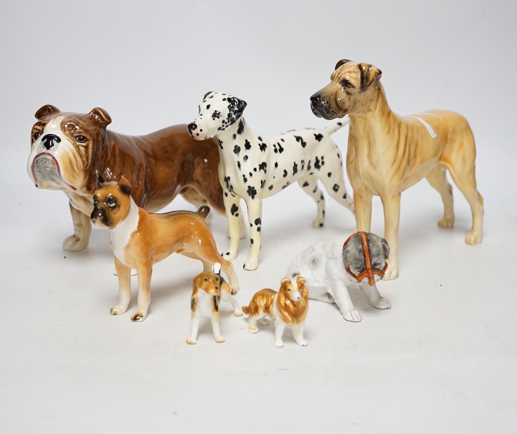 A collection of dog figures including Border Fine Art, tallest Great Dane 17cm high